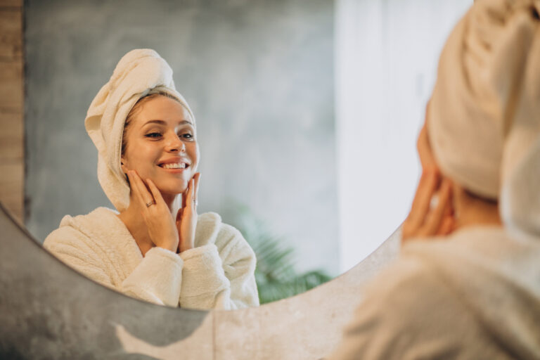 Cute Skincare: The Self-Care and the Aesthetic Beauty. 1 woman home applying cream mask